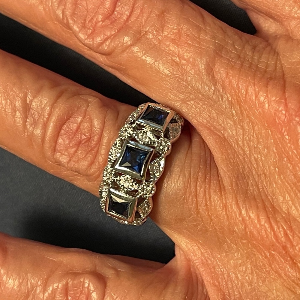 925 high polished, sterling silver, dark blue & clear stone ring. Easy to wear!